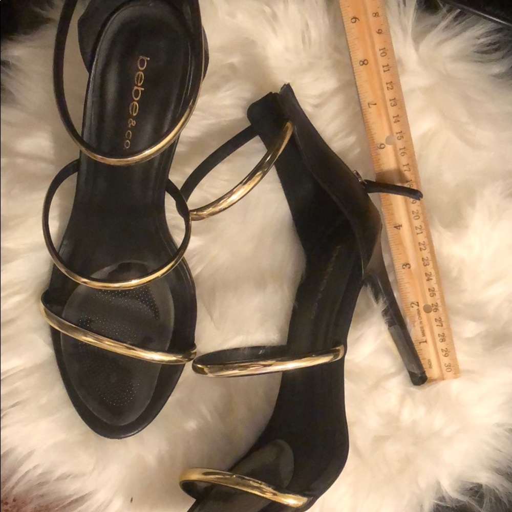 Bebe & Co. Black and gold heels
